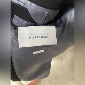 Brand new Perry Ellis Black sports coat. Size 40s
